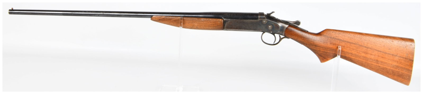 Iver Johnson Champion .410 Gauge Single Shot Break-Action Shotgun, Patented 1915: An Iver Johnson Champion .410 Gauge Single Shot Break-Action Shotgun. This American-made firearm features a blued steel barrel and a case-hardened receiver. The barrel is marked ---410 BORE-FULL CHOKE