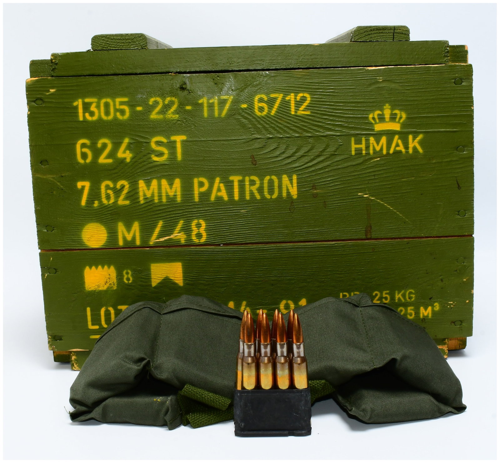 576 Rounds of Danish 7.62mm M/48 .30-06 Springfield Ammunition on En Bloc Clips with Bandoliers in: A quantity of Danish 7.62mm M/48 .30-06 Springfield ammunition, comprising 576 rounds. This lot features .30-06 Springfield ammunition on en bloc clips with bandoliers, housed within its original wood