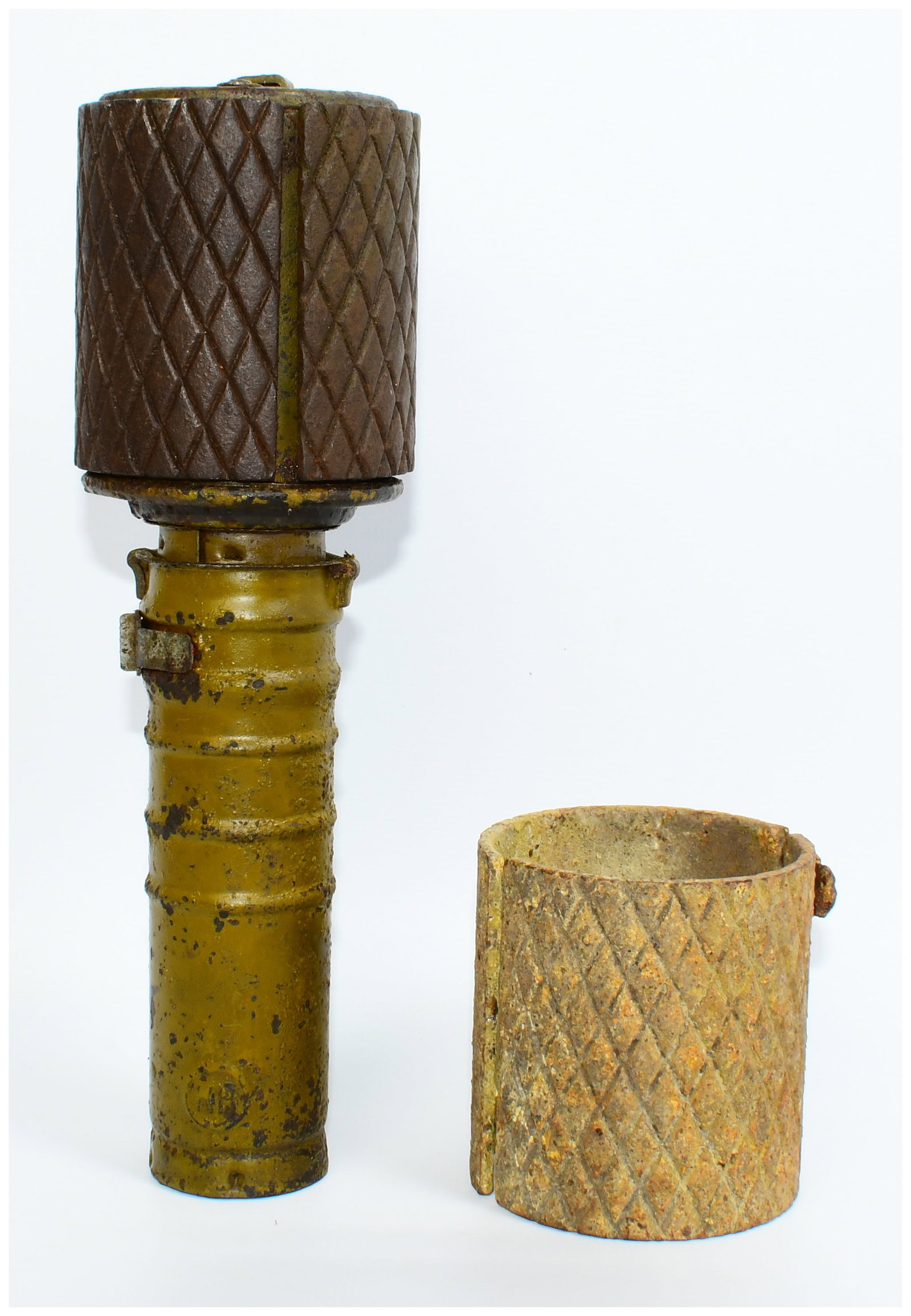 WWII Soviet Russian RGD-33 Inert Stick Grenade with Fragmentation Sleeve: An original WWII Soviet Russian RGD-33 Inert Stick Grenade with Fragmentation Sleeve. This lot presents two related military artifacts. The primary item is a metal stick grenade featuring a cylindrica