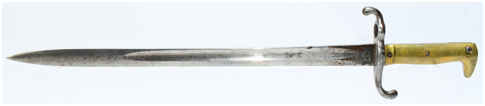 Mid-to-Late 19th Century German Military Sword Bayonet by S & K Sons Solingen: A mid-to-late 19th century German military sword bayonet, manufactured by S & K Sons Solingen. It features a steel blade with a single fuller. The brass grip is present, along with a steel quillon tha