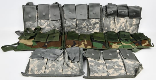 A Collection of USGI Military MOLLE II 6 Magazine Bandoleer Ammunition Pouches in UCP and Woodland