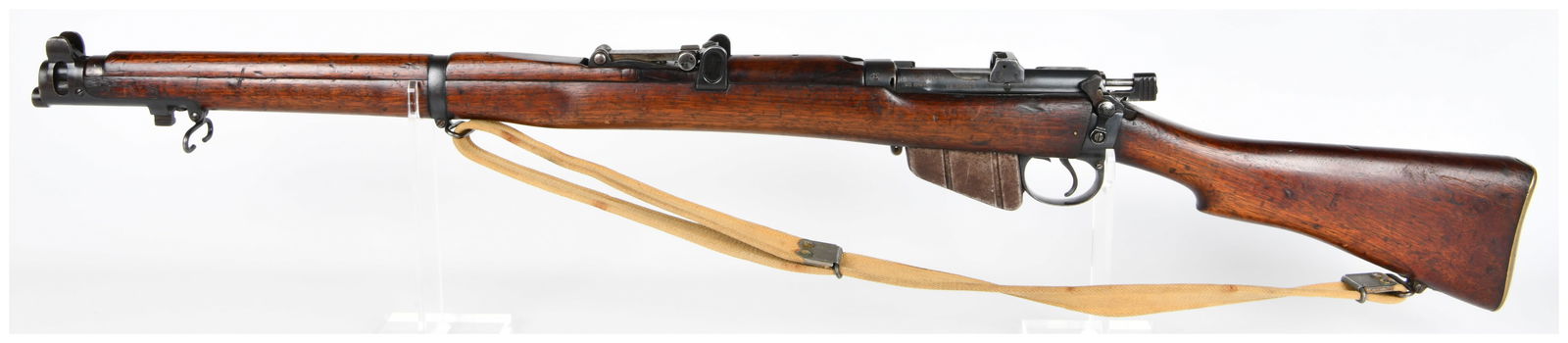 1918 Lee Enfield No. 1 Mk. III* Bolt-Action Rifle, .303 British Caliber: A British Lee Enfield No. 1 Mk. III* bolt-action rifle, dated 1918. The rifle features a dark-stained wooden stock and forend, with blued or parkerized steel components and a brass buttplate. Markings