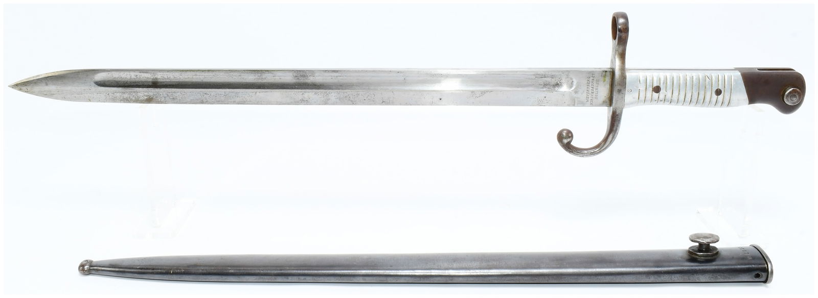 Argentine Model 1891 Mauser Bayonet by Weyersberg Kirschbaum & Co. Solingen, Dated 1891: An Argentine Model 1891 Mauser bayonet, manufactured by Weyersberg Kirschbaum & Co. Solingen. This late 19th-century military bayonet features a steel blade with a fuller, a hooked steel quillon, and