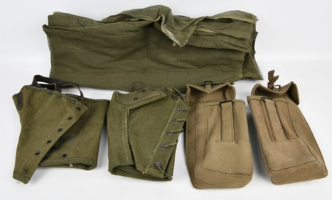 A Group of U.S. WWII Military Surplus Gear, including M1938 Canvas Leggings, Khaki Utility Pouches,