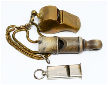 Three Vintage Whistles, including a U.S. Military Brass Pea Whistle