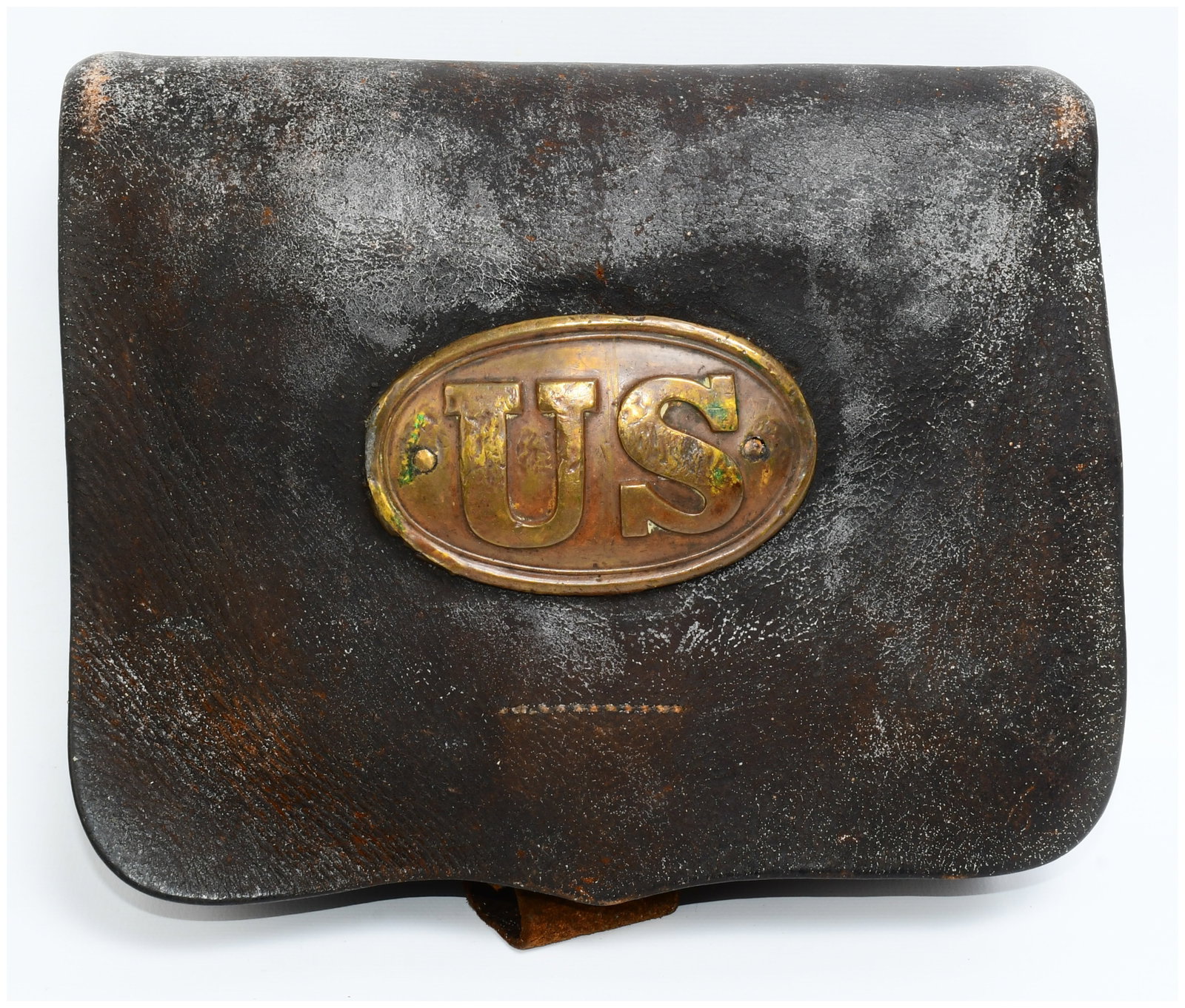 U.S. Civil War Model 1861 Cartridge Box with US Plate and Tins: A U.S. Civil War Model 1861 Cartridge Box, constructed from dark leather with a flap closure. The front features a prominent oval brass plate with the raised letters "US". Additional brass hardware in