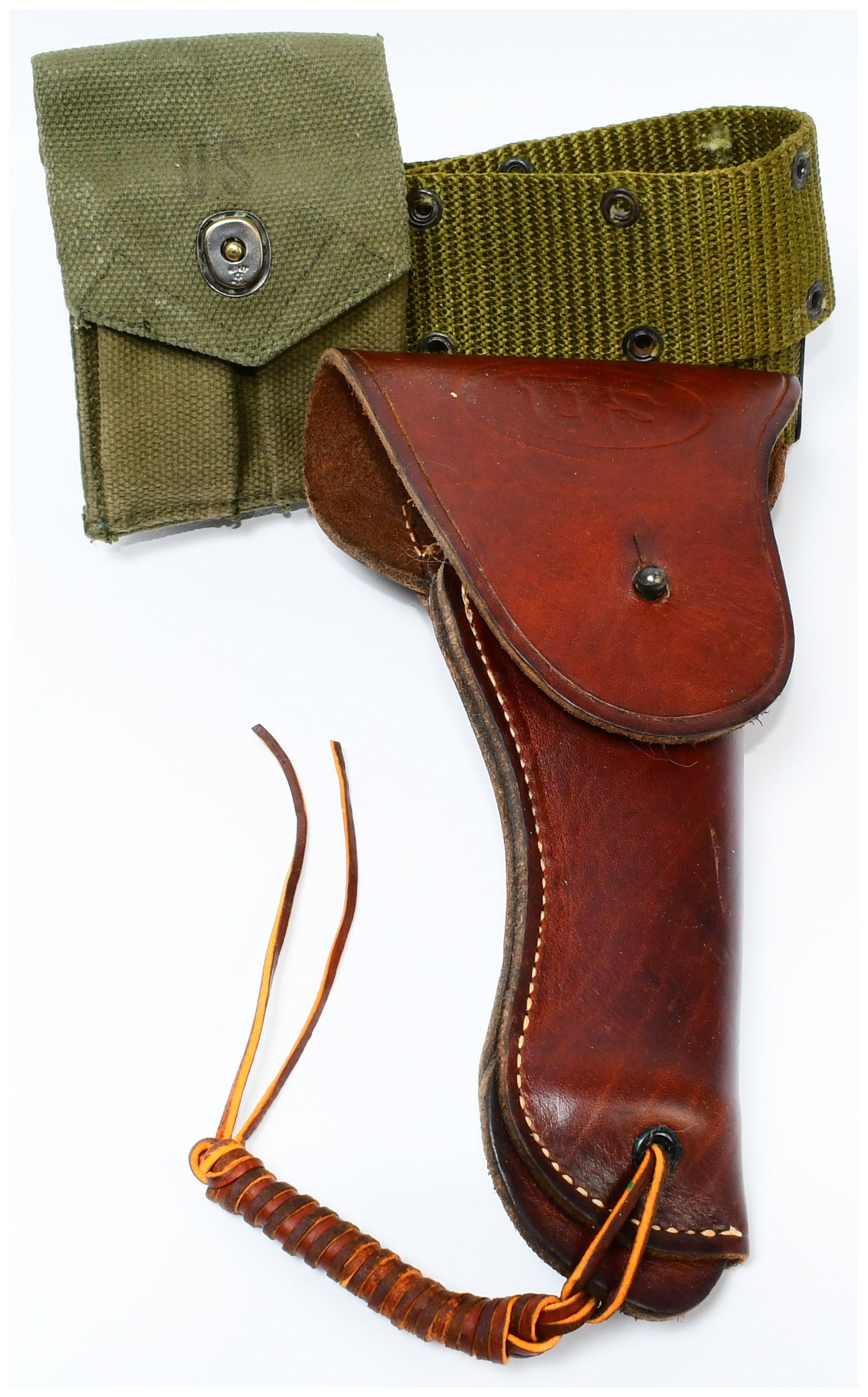 A WWII U.S. Army M1936 Pistol Belt Rig with M1916 Leather Holster by Graton & Knight Co., 1942, and: This lot presents a three-piece ensemble of U.S. Army military utility gear from World War II. The rig comprises an M1936 olive green canvas webbing pistol belt, an M1916 dark reddish-brown leather ho