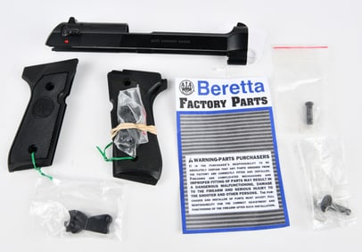 A Collection of Beretta M9 9mm Factory Pistol Components