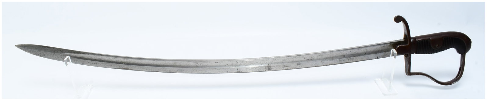 An Imperial German Model 1873-96 Artillery Saber: An Imperial German Model 1873-96 Artillery Saber, featuring a pronouncedly curved, single-edged steel blade with a full-length fuller. The hilt consists of a single iron or steel knuckle guard and a d