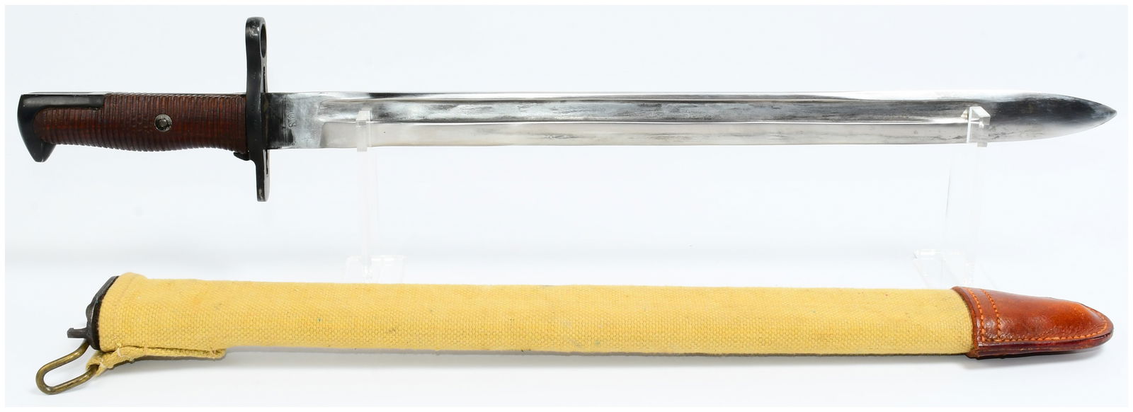 US Model 1905 Bayonet by Rock Island Armory, Dated 1908, with Scabbard: A US Model 1905 bayonet manufactured by Rock Island Armory, dated 1908, accompanied by its scabbard. The bayonet features a polished steel blade with double fullers. The ricasso is marked "US" on one