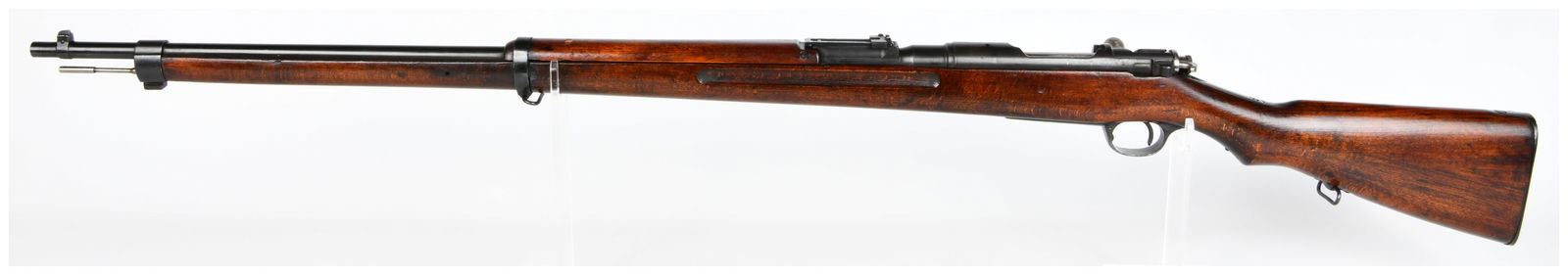 Japanese Arisaka Type 30 Bolt-Action Military Rifle with Hook Safety, Serial No. 12967: A Japanese Arisaka Type 30 bolt-action military rifle with hook safety. This rifle features a dark reddish-brown stained wooden stock and handguard, complemented by blued steel components for the barr