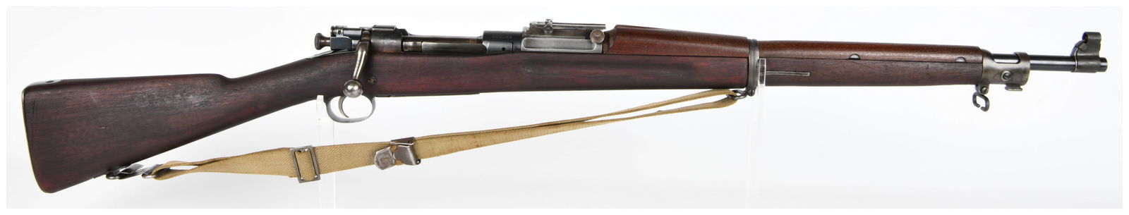 U.S. Springfield Armory Model 1903 Bolt Action Rifle, Dated 1918: A U.S. Springfield Armory Model 1903 Bolt Action Rifle, chambered in .30-06 caliber. The rifle features a full stock of dark-stained wood and blued steel metal components. The receiver is clearly mark