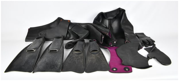A Collection of Vintage Diving Equipment, including a Wetsuit and Three Pairs of Fins by Cressi,