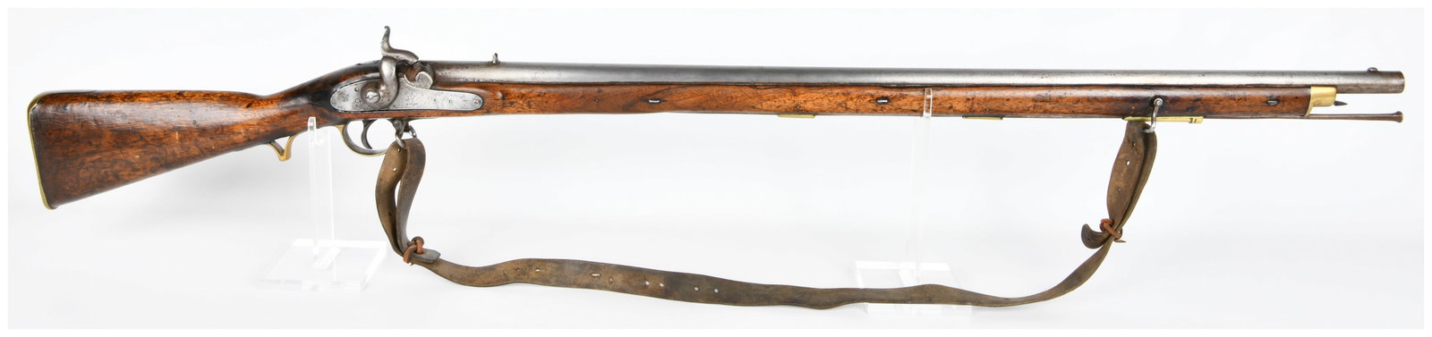 British East India Company Model F Pattern of 1842 Percussion Musket: An antique British East India Company Model F Pattern of 1842 Percussion Musket. This long gun features a dark hardwood full stock, a heavy steel barrel, and a matching steel percussion lock mechanism