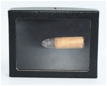 An Antique Cased Pinfire Cartridge
