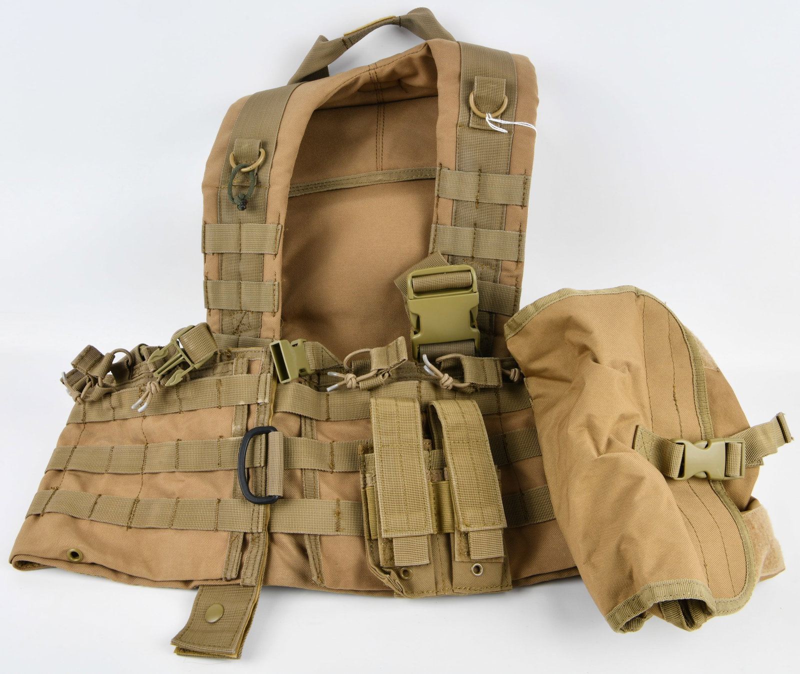 Condor Modular Chest Set in Coyote Brown with Comprehensive Survival and First-Aid Collection: A Condor Modular Chest Set in coyote brown, featuring extensive MOLLE webbing, plastic buckles, and a top carry handle. Attached is a small tan medical utility pouch, marked with a red cross patch. Th