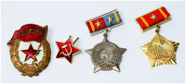 A Collection of Vietnamese NLF 'Quy?t Th?ng' and 'Kh?ng Chi?n' Medals with Soviet Badges
