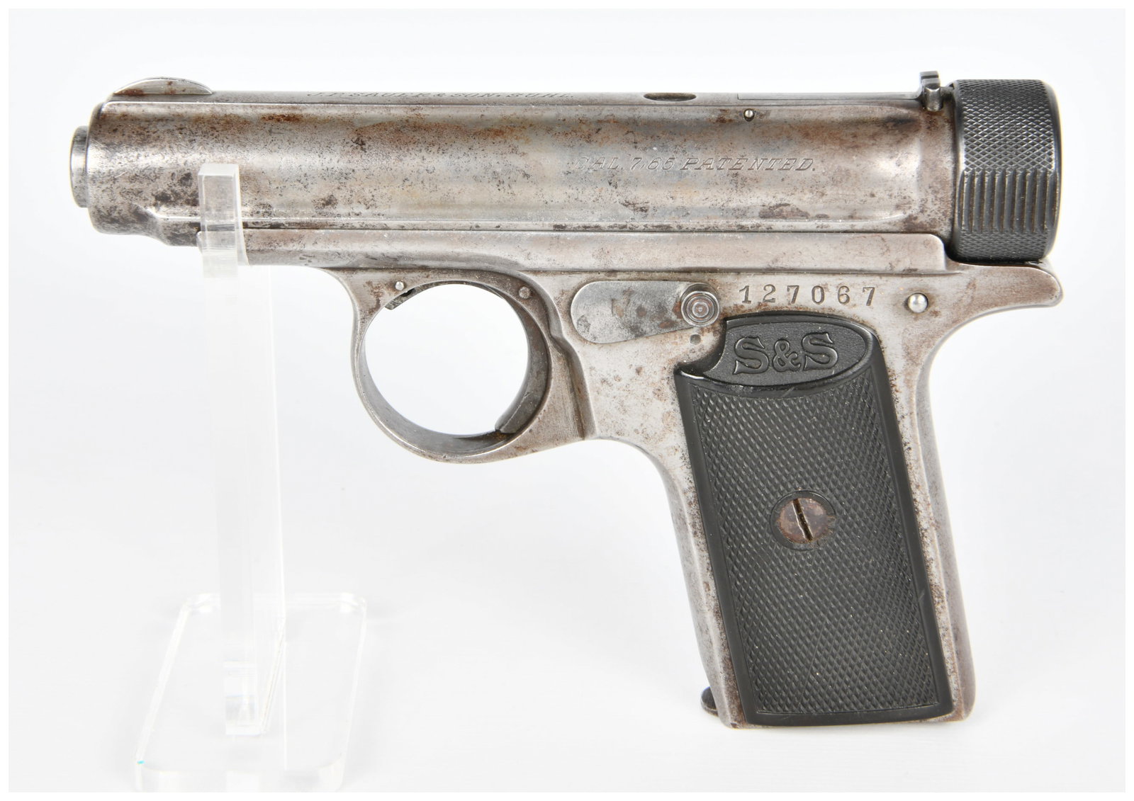 J.P. Sauer & Sohn Model 1913 7.65mm Semi-Automatic Pistol: A J.P. Sauer & Sohn Model 1913 7.65mm semi-automatic pistol, primarily constructed of steel with black checkered grip panels, likely hard rubber, secured by a single screw. Visible markings on the sli