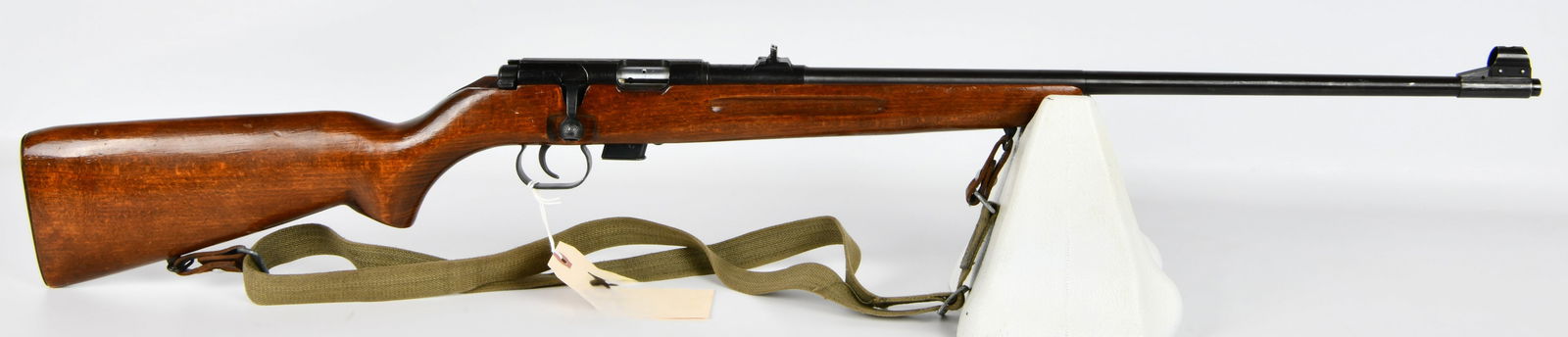 A Romanian M1969 IMC2 Bolt Action .22LR Training Rifle, Serial Number K-9018: A Romanian M1969 IMC2 bolt-action .22LR training rifle, featuring a dark-stained wooden stock, blued steel barrel, receiver, and components. The rifle is equipped with a detachable metal magazine and