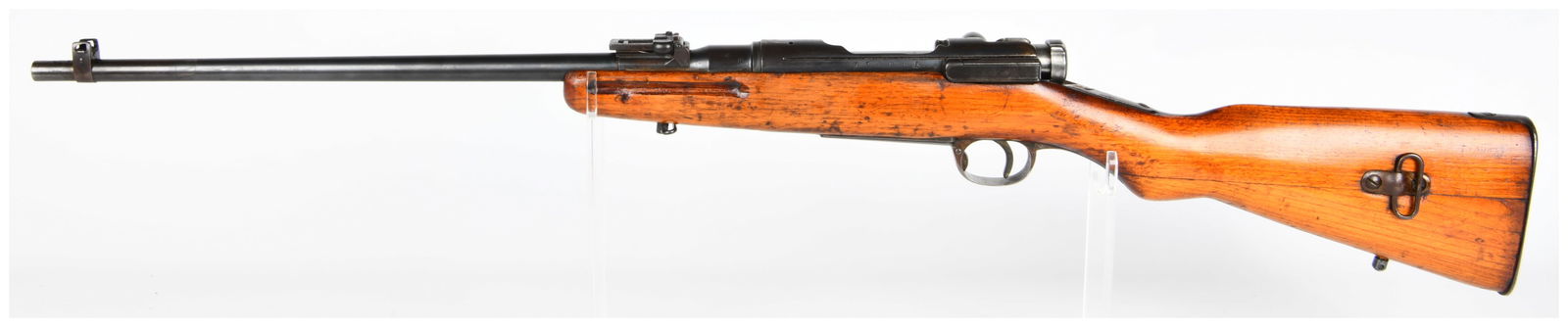 Japanese Arisaka Type 38 Bolt-Action Rifle, Kokura Arsenal: A Japanese Arisaka Type 38 bolt-action rifle, manufactured at the Kokura Arsenal. This rifle features a blued steel barrel, receiver, and operating parts, paired with a full-length, reddish-brown hard