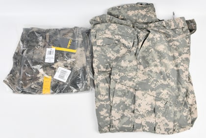 A Pair of U.S. Army Combat Uniform (ACU) Digital Camouflage Trousers and Cabela's O2 Octane