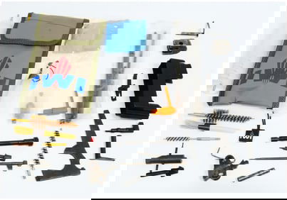 A Collection of IWI Branded Firearm Maintenance Tools and Assorted Gun Parts