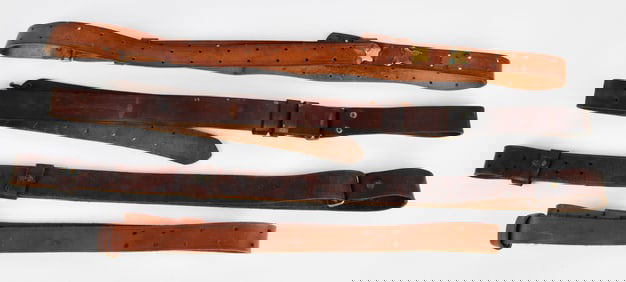 A Group of Four Vintage Leather Military Rifle Slings
