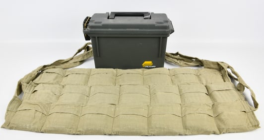 A Plano Molding 1354 Stow N Go Utility Case with a Khaki Ammunition Bandolier and Rifle Ammunition