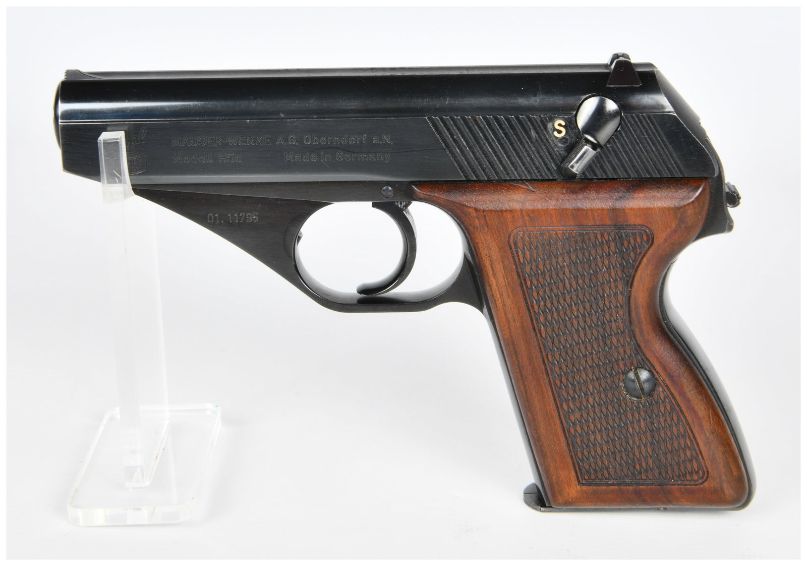 Mauser HSc Semi-Automatic Pistol, Interarms Distributed: A Mauser HSc semi-automatic pistol, distributed by Interarms. The pistol features blued metal construction with checkered dark wood grip panels. The left side of the slide is marked "Original MAUSER",