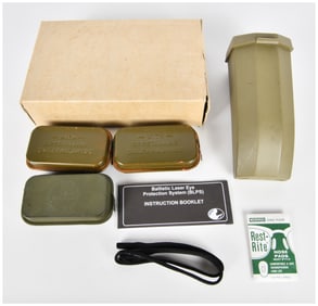 A Group of WWII U.S. Government Carlisle Model First Aid Packets and Ballistic Laser Eye Protection