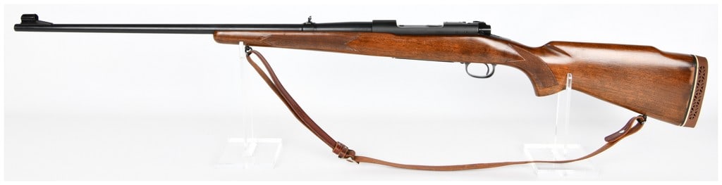 Win Model 70 Bolt-Action Sporting Rifle .264 Win. Mag 26" Barrel Pre-64 Production: A Winchester Model 70 bolt-action sporting rifle, chambered in .264 WIN. MAGNUM, featuring a 26" barrel and identified as Pre-64 Production. The rifle displays barrel markings including "WINCHESTER -