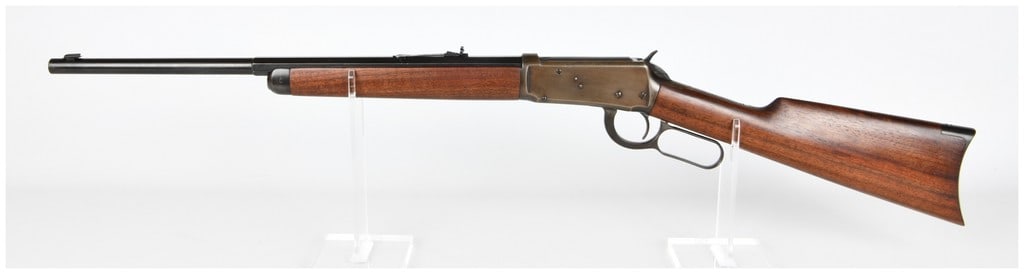 Win Model 1894 Lever-Action Rifle .30 W.C.F. Serial No. 155943: A Winchester Model 1894 lever-action rifle, chambered in .30 W.C.F., manufactured by the Winchester Repeating Arms Co. of New Haven, Connecticut, U.S.A. The rifle features a dark reddish-brown wooden 