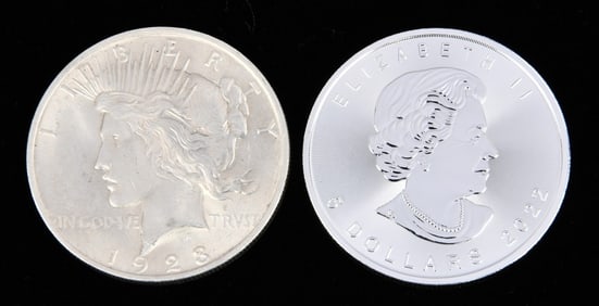 1928 American 'Peace Dollar' and a 2022 Canadian 'Silver Maple Leaf' Bullion Coin