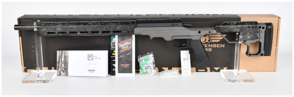 Brand New Christensen Arms MPR Rimfire Bolt-Action Rifle .17 HMR Tungsten Chassis with Forged Carbon: A Brand New Christensen Arms MPR Rimfire bolt-action rifle, featuring a "Tungsten" finished metal chassis with a black polymer grip. The rifle is equipped with a "carbon tension" barrel and handguard,
