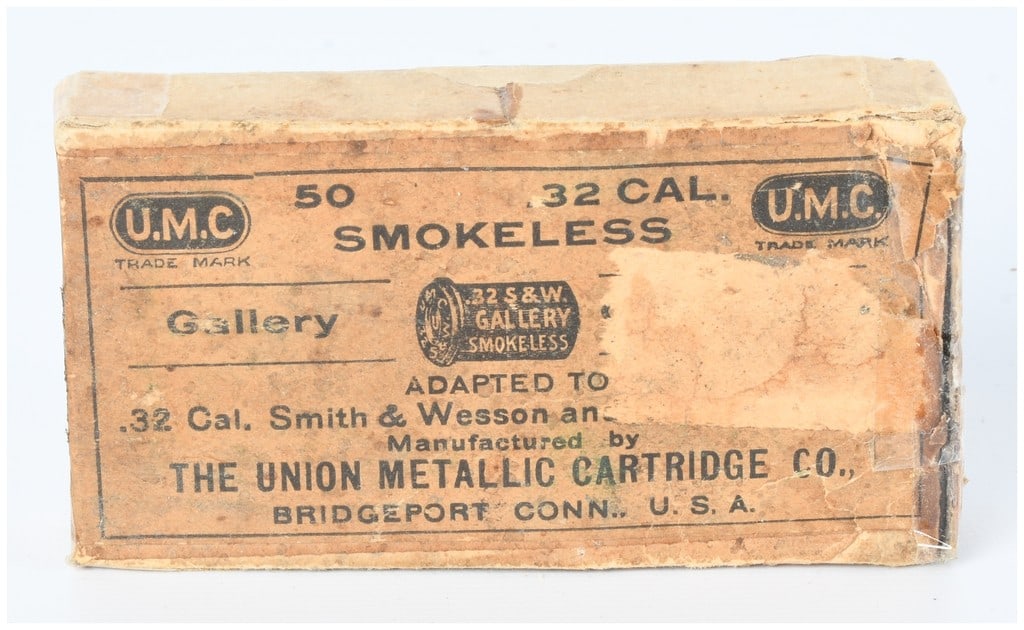Vintage UMC/Union Metallic Ammo Co. .32 S&W Smokeless Gallery Ammo 30 Live Rounds: A vintage box of UMC/Union Metallic Cartridge Co. .32 S&W Smokeless Gallery ammunition. The aged brown cardboard box features black printed text, prominently displaying the 'UMC' (Union Metallic Cartr
