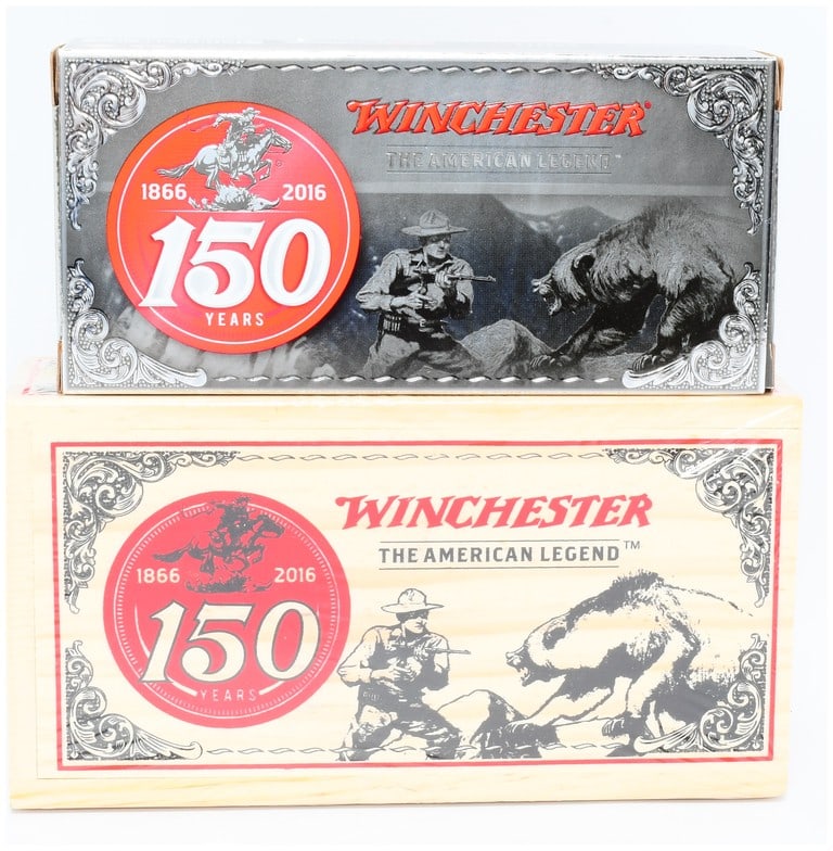Win 150th Anniversary 30-30 Win 150 gr Power-Point Ammo 20 Rounds: A commemorative set of Winchester X3030W150 150th Anniversary 30-30 Win 150 gr Power-Point ammunition, comprising an outer wooden crate and an inner cardboard box. Both packages feature "Winchester" a