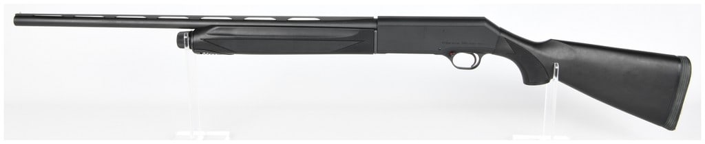 P. Beretta 390 20 Gauge Semi-Automatic Shotgun 26" Barrel Modified Choke: A P. Beretta 390 semi-automatic shotgun, 20 Gauge, featuring a 26" barrel with a modified choke. The shotgun is predominantly finished in matte black metal and synthetic polymer for the stock and fore
