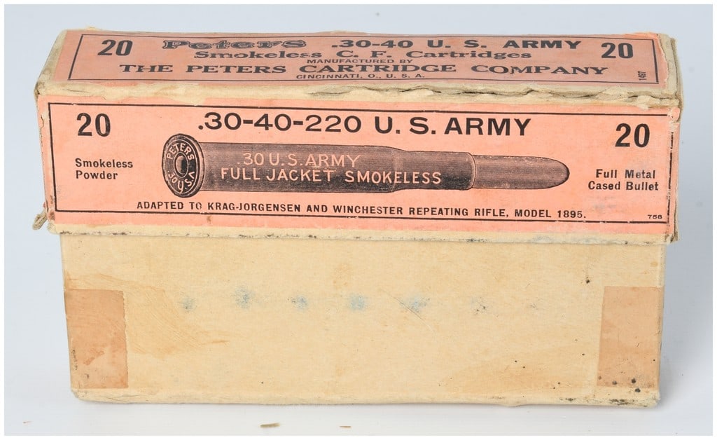 Vintage Peters Ammo Co. .30-40 U.S. Army Krag Smokeless Ammo 20 Live Rounds: A vintage cardboard box of Peters Cartridge Company .30-40 U.S. Army Smokeless C.F. Cartridges, containing 20 brass-cased live rounds. The box features distinct orange and green printed labels, identi