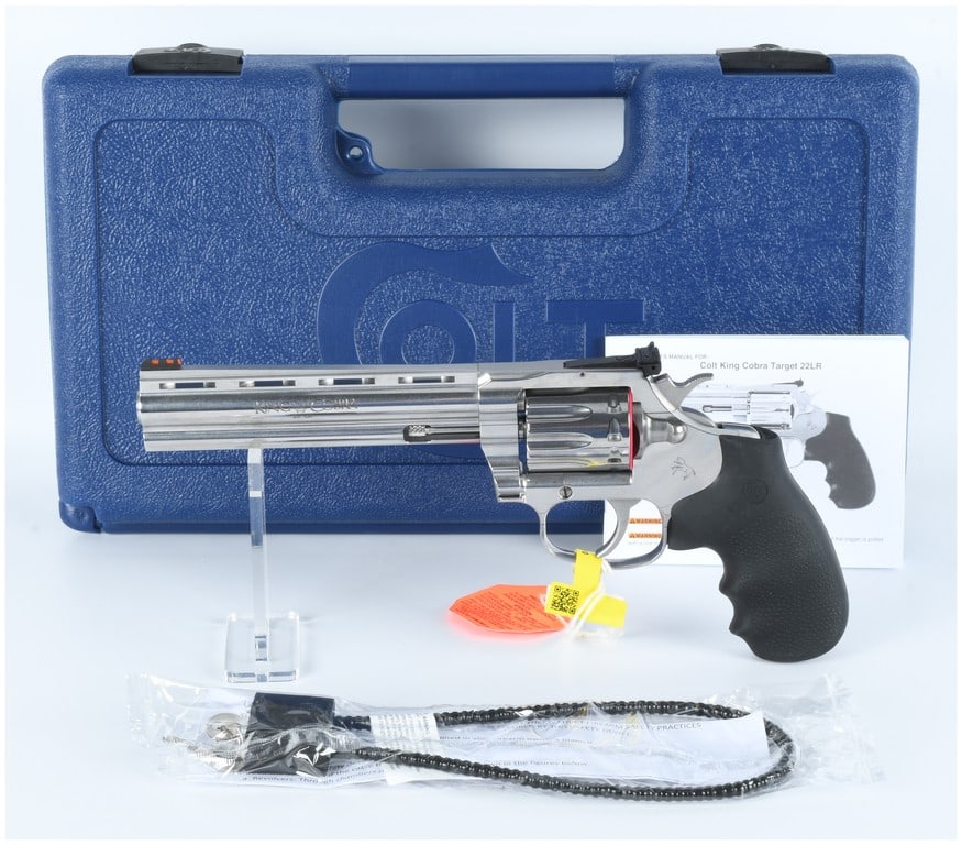Colt King Cobra Target .22 LR Revolver 6-inch Barrel New in Box Ammo: A modern Colt King Cobra Target .22 LR Revolver, crafted from polished stainless steel and fitted with black textured synthetic grips. It features a 6-inch ventilated rib barrel with a high-visibility