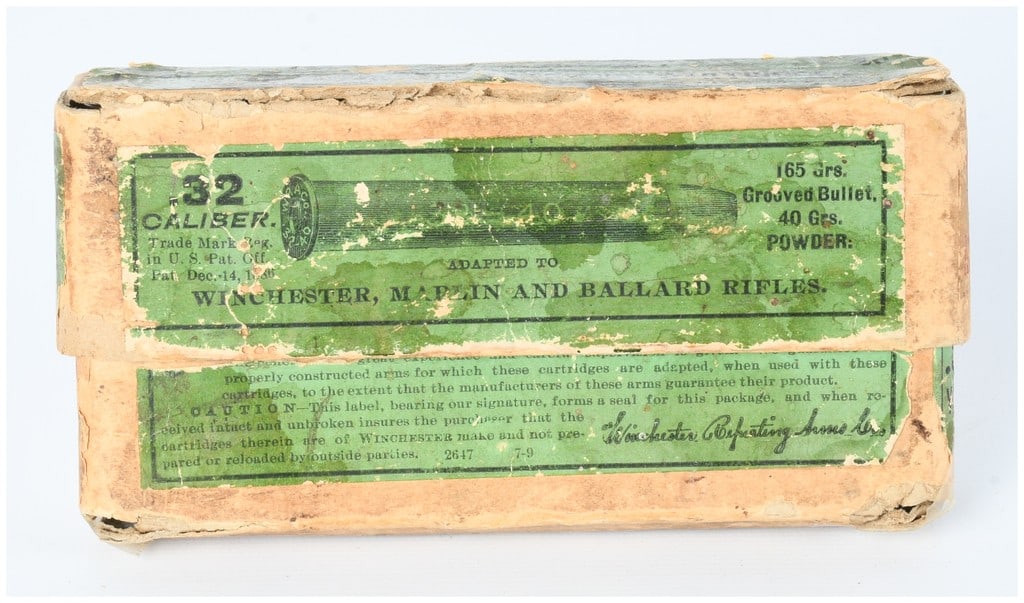 Vintage Box of Win 32-40 Center Fire Ammo 18 Live Rounds: A vintage box of Winchester 32-40 Center Fire Cartridges. Containing 18 live rounds, this vintage cardboard box was manufactured by the Winchester Repeating Arms Co. of New Haven, Connecticut. The box