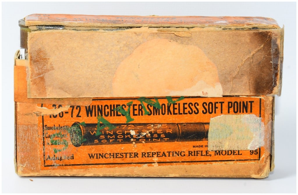 Vintage Win .38-72 Smokeless Soft Point Ammo 12 Rounds: A vintage box of Winchester .38-72 Smokeless Soft Point Center Fire rifle cartridges. This lot comprises 12 rounds, housed within an orange paper-labeled cardboard box originally intended for 20 cartr