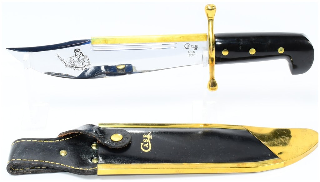 Case XX 1836 Davy Crockett Bowie Knife WITH SHEATH: A Case XX 1836 Davy Crockett Bowie Knife WITH SHEATH. This contemporary Bowie knife features a large, polished metal clip-point blade, etched with a frontiersman figure, commonly associated with Davy 