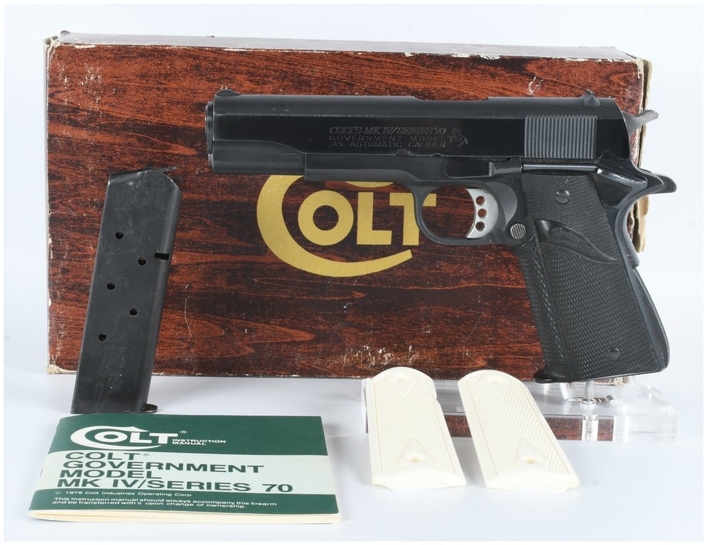 Colt MK IV Series 70 Government Model .45 Automatic Cal Pistol: A Colt MK IV Series 70 Government Model .45 Automatic Caliber semi-automatic pistol, featuring a blued steel finish. The slide is marked "COLT'S MK IV/SERIES '70 GOVERNMENT MODEL .45 AUTOMATIC CALIBER