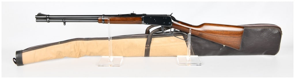 Win Model 94 Lever-Action Rifle .32 W.N. SPL. with 20" Barrel Serial No. 2397611: This lot features a Winchester Model 94 lever-action rifle, chambered in .32 W.N. SPL., with a 20" barrel. The rifle is characterized by its blued metal components and polished dark wood stock and for
