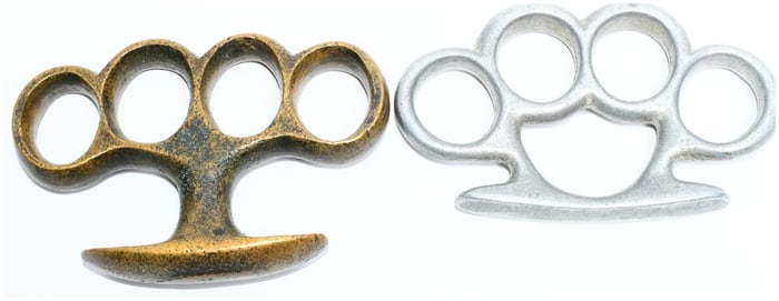 Pair of Knuckle Dusters One Brass One of Silvery Metal