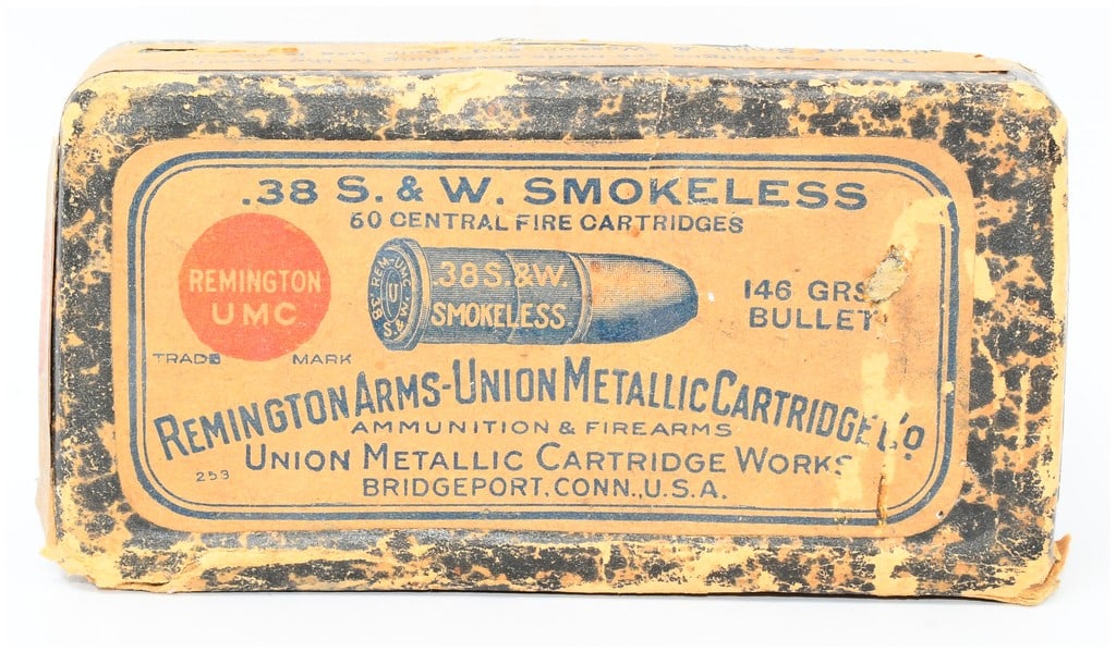 Vintage Rem Arms-Union Metallic Ammo Co. .38 S&W Smokeless Ammo Box with 50 Mixed Rounds: A vintage rectangular cardboard ammunition box by Remington Arms-Union Metallic Cartridge Co., Union Metallic Cartridge Works, Bridgeport, Conn., U.S.A. The faded, torn, and discolored paper label pro