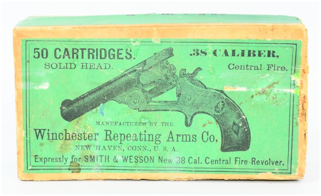 50 ROUNDS Win .38 Cal Central Fire Solid Head Ammo Box Expressly for Smith & Wesson: A vintage cardboard ammunition box, manufactured by Winchester Repeating Arms Co. in New Haven, Conn., U.S.A., for .38 caliber central fire cartridges, expressly for Smith & Wesson New .38 Cal. Centra