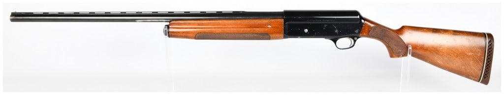 S.P.A. Luigi Franchi Semi-Automatic Shotgun with 28" Barrel dated 1965 12 Gauge: A semi-automatic shotgun manufactured by S.P.A. Luigi Franchi, 12 Gauge, Brescia, Made in Italy, featuring a 28" barrel. The firearm is constructed from blued steel for the barrel and receiver, comple