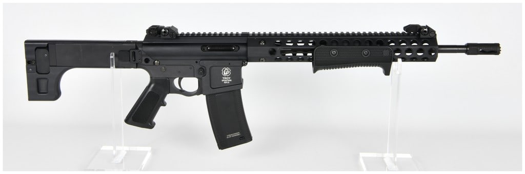 Troy Sporting Rifle Manually Operated (Pump/Straight-Pull) Caliber .223: A single Troy Sporting Rifle, Serial Number TPR09170161. This is a modern sporting rifle designed for compliance with restrictive firearms regulations, utilizing a manually operated action (either