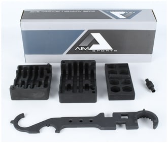 A Group of Six AIM Sports AR Platform Armorer Tools and Vise Blocks